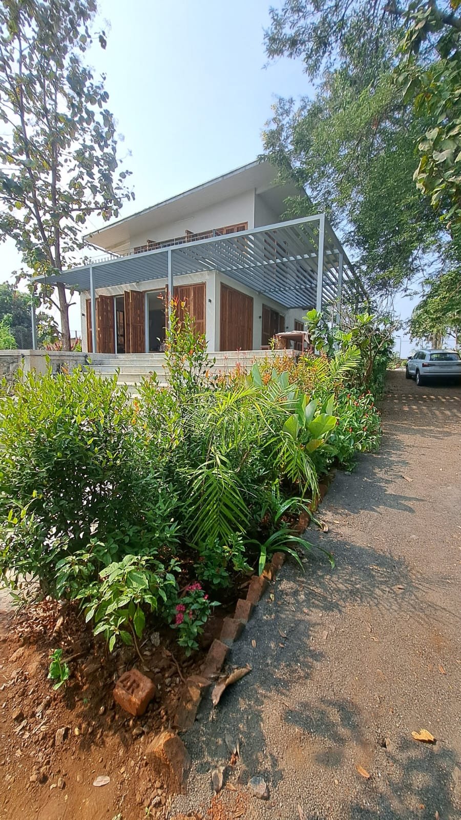 Checkerboard grass and paver design
